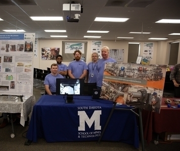 CASPAR booth at Neutrino Day